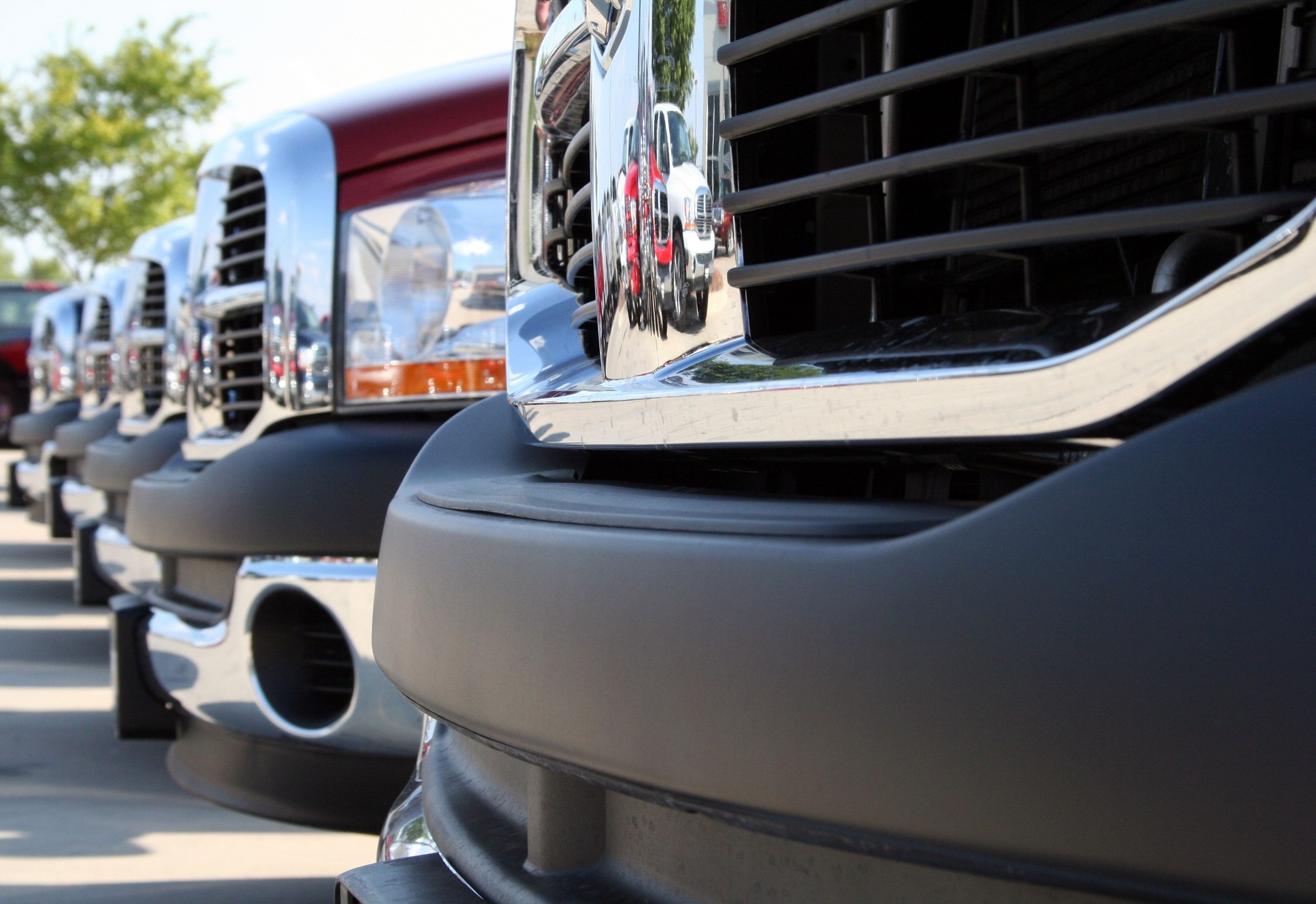 Shiny Grids On Front Of New Trucks At Car Lot