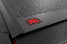 Load image into Gallery viewer, Hard Low Profile Bed Cover | 5'7" Bed | Cargo Mgmt | Toyota Tundra (22-24)