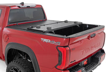 Load image into Gallery viewer, Hard Low Profile Bed Cover | 5'7" Bed | Cargo Mgmt | Toyota Tundra (22-24)