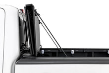 Load image into Gallery viewer, Hard Tri-Fold Flip Up Bed Cover | 5' Bed | Nissan Frontier 2WD/4WD (05-21)