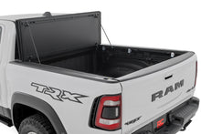 Load image into Gallery viewer, Hard Tri-Fold Flip Up Bed Cover | 6'4" | Ram 1500 (19-25)/1500 TRX (21-24)