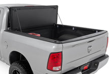 Load image into Gallery viewer, Hard Tri-Fold Flip Up Bed Cover | 5'7" Bed | Ram 1500 2WD/4WD (2009-2018 &amp; Classic)