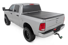 Load image into Gallery viewer, Hard Tri-Fold Flip Up Bed Cover | 6'4" Bed | Ram 1500 (09-18)/2500 (10-24) 