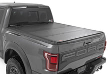 Load image into Gallery viewer, Hard Tri-Fold Flip Up Bed Cover | 5'7" Bed | Ford F-150 (21-24)/F-150 Lightning (22-24) 