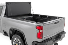 Load image into Gallery viewer, Hard Tri-Fold Flip Up Bed Cover | 6'9" Bed | Chevy/GMC  Silverado/Sierra 2500HD/3500HD (20-24)
