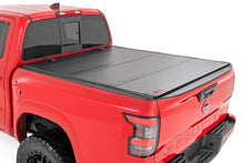 Load image into Gallery viewer, Hard Tri-Fold Flip Up Bed Cover | 5' Bed | Nissan Frontier 2WD/4WD (22-24)