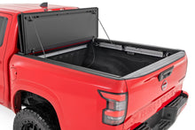 Load image into Gallery viewer, Hard Tri-Fold Flip Up Bed Cover | 5' Bed | Nissan Frontier 2WD/4WD (22-24)