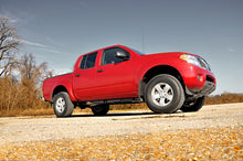Load image into Gallery viewer, 2.5 Inch Leveling Kit | Red Spacers | Nissan Frontier (05-24)/Xterra (05-15) 