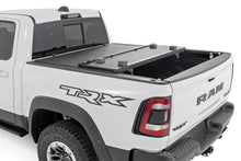 Load image into Gallery viewer, Hard Low Profile Bed Cover |6'4" | No Rambox | Ram 1500 (19-25)/1500 TRX (21-23)